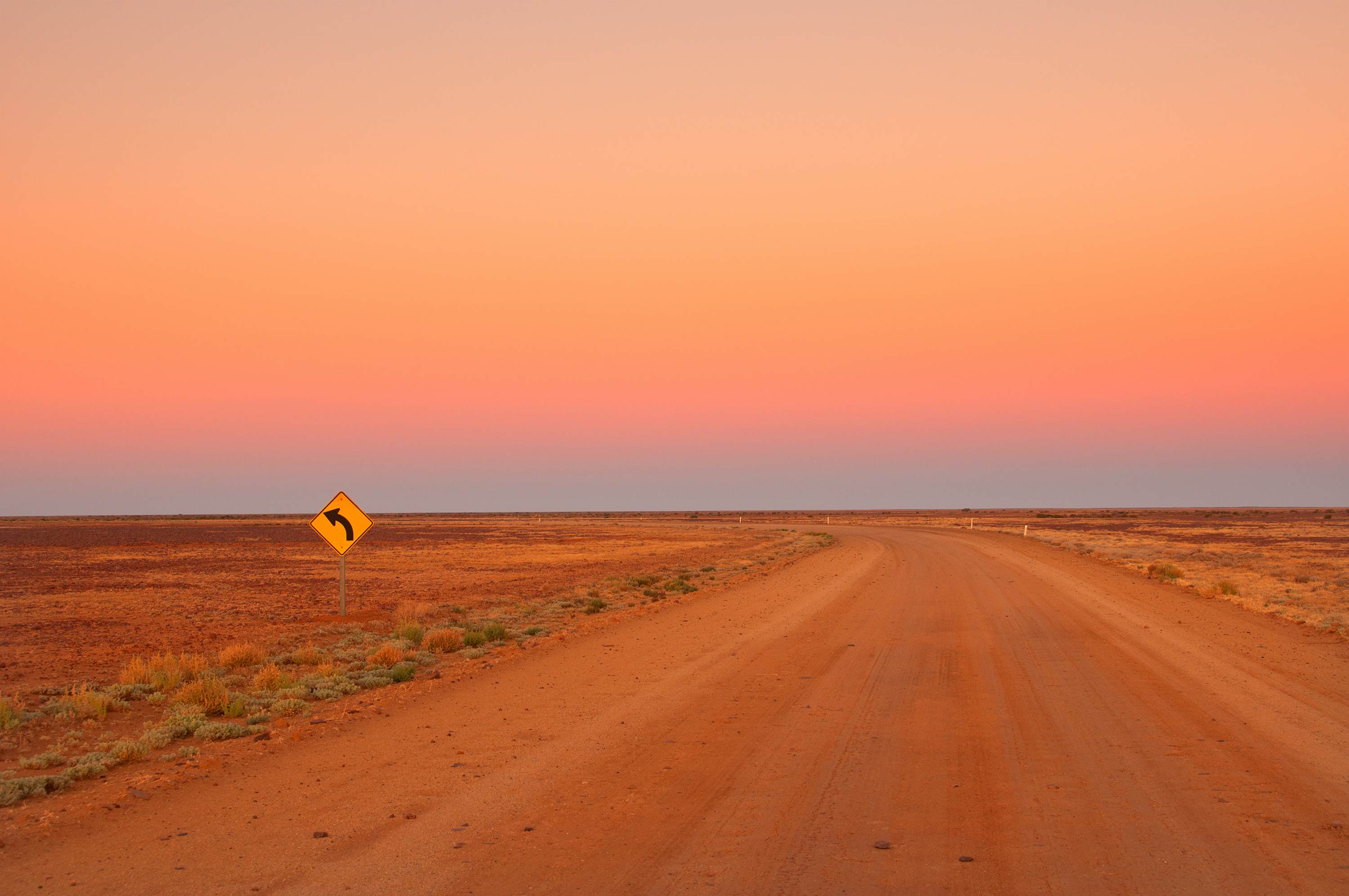 road leading into the sunset
