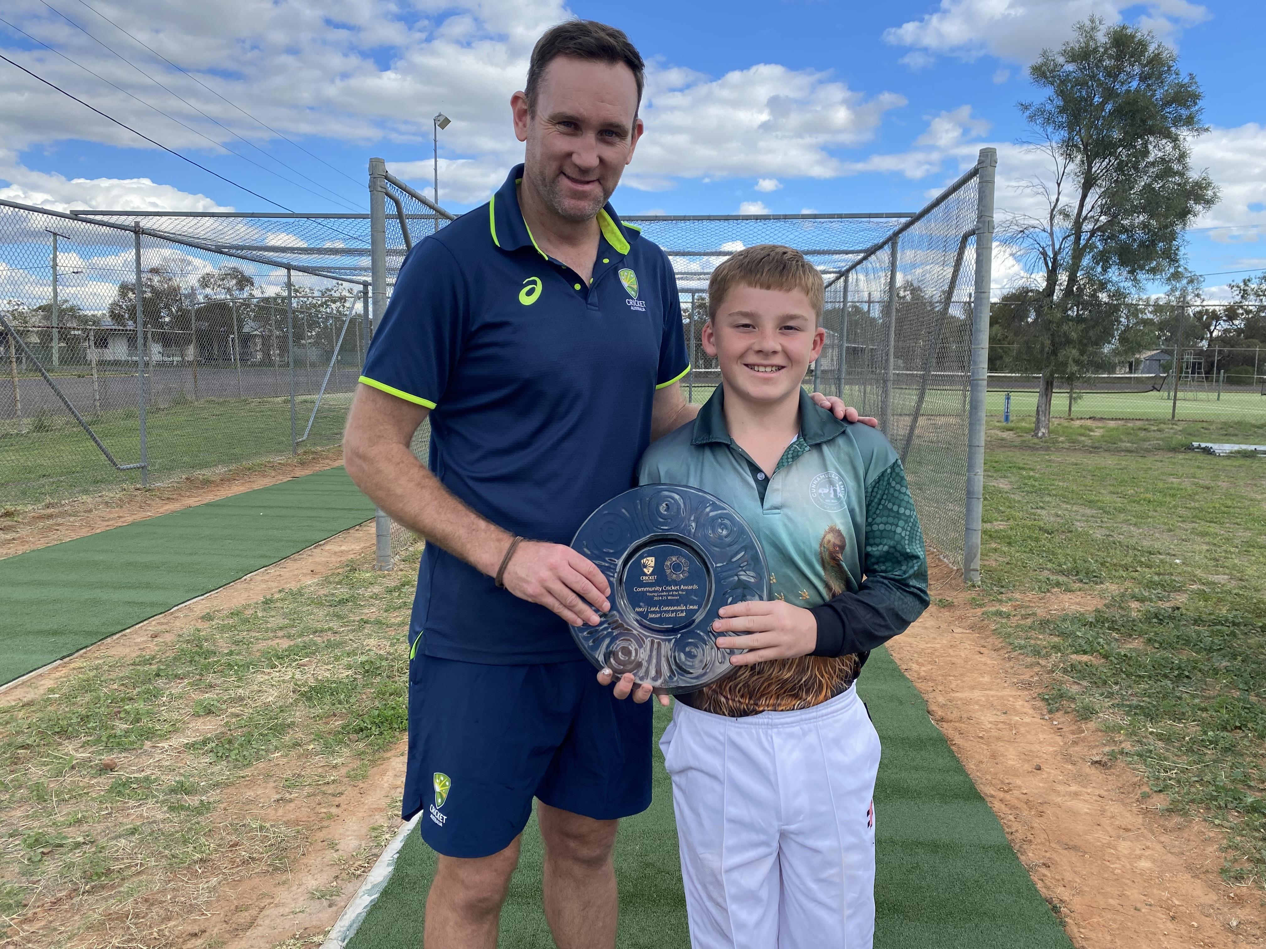 Ben DeAraugo, National Volunteer Manager at Cricket Australia with 12-year-old Henry Land.